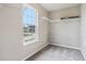 Walk-in closet featuring a window and wire shelving for optimal storage at 1739 Wedgewood Pl, Avon, IN 46123