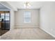 Dining room with carpet, a window, and view into the kitchen with stainless steel appliances at 1739 Wedgewood Pl, Avon, IN 46123