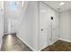 Hallway and staircase with tile floors. Skylight above the entry way provides plenty of natural light at 1739 Wedgewood Pl, Avon, IN 46123