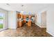 Open kitchen with stainless steel appliances, granite countertops, and island at 1739 Wedgewood Pl, Avon, IN 46123
