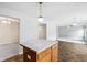 Open kitchen featuring granite counters, stainless appliances, and center island at 1739 Wedgewood Pl, Avon, IN 46123