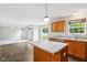 Bright kitchen featuring granite counters, stainless appliances, tile floors and an island with seating at 1739 Wedgewood Pl, Avon, IN 46123