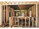 View of house's interior framing, exposed beams, and structural supports at 1917 Union St, Indianapolis, IN 46225