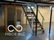 Basement featuring stairway access and sauna at 2028 Gilmore St, Columbus, IN 47201