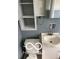 Bathroom featuring toilet, sink, and mirrored cabinet at 2028 Gilmore St, Columbus, IN 47201