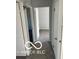 Hallway view showcasing carpet floors and white paneled doors at 2028 Gilmore St, Columbus, IN 47201