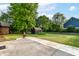 Large backyard with a shed, patio, and fire pit at 206 Banbury Rd, Noblesville, IN 46062