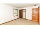 Bedroom featuring carpet, a window, and closet at 206 Banbury Rd, Noblesville, IN 46062