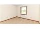 Carpeted bedroom with trim and a bright window at 206 Banbury Rd, Noblesville, IN 46062