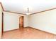 Dining room with hardwood floors, neutral wall color, and modern light fixture at 206 Banbury Rd, Noblesville, IN 46062