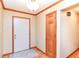 Inviting entryway with neutral walls, wood trim, and stylish tile accents at 206 Banbury Rd, Noblesville, IN 46062