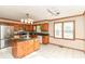 Bright eat-in kitchen featuring an island with granite countertops and stainless steel appliances at 206 Banbury Rd, Noblesville, IN 46062
