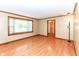 Spacious living room with wood-look floors and a bay window at 206 Banbury Rd, Noblesville, IN 46062