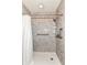 Accessible shower with handrails and shower head at 206 Banbury Rd, Noblesville, IN 46062