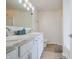 Bathroom featuring a double vanity, granite countertops, and modern fixtures at 2101 Shadow Fox Dr, Columbus, IN 47201