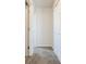 Neutral hallway with carpet and doors at 2101 Shadow Fox Dr, Columbus, IN 47201