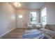 Inviting living area with lots of natural light, neutral colors, and modern decor at 2101 Shadow Fox Dr, Columbus, IN 47201
