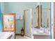 Elegant bathroom featuring a unique tiled tub surround and separate glass-enclosed shower at 239 E 11Th St, Indianapolis, IN 46202