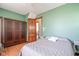 Bright bedroom with hardwood floors, large windows, and ample closet space perfect for a restful retreat at 239 E 11Th St, Indianapolis, IN 46202