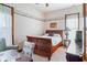Cozy bedroom with a classic sleigh bed and nautical-themed wallpaper border at 239 E 11Th St, Indianapolis, IN 46202