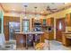 Charming kitchen with wooden cabinets, stainless appliances, and a center island at 239 E 11Th St, Indianapolis, IN 46202