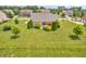 Aerial view of a home's spacious backyard featuring vibrant landscaping at 2948 Chalbury Dr, Plainfield, IN 46168