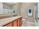 Bathroom featuring tile floors, a sink and countertop with a view of the shower at 2948 Chalbury Dr, Plainfield, IN 46168