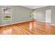 Well-lit bedroom with hardwood flooring, neutral walls, and windows at 2948 Chalbury Dr, Plainfield, IN 46168