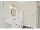 A well lit bathroom shows mirror, vanity and storage at 3301 N 200 W, Franklin, IN 46131