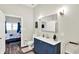 This bathroom has a dark blue vanity with a white countertop at 3301 N 200 W, Franklin, IN 46131