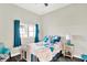 Bright bedroom with white metal bed frame and blue-themed decor at 3301 N 200 W, Franklin, IN 46131