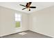 Bedroom featuring a ceiling fan and a window that offers exterior views of land at 3301 N 200 W, Franklin, IN 46131