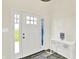 Bright foyer with a white door and table at 3301 N 200 W, Franklin, IN 46131