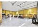 Spacious garage with a high ceiling, concrete floor, and ample room for vehicles and equipment at 3301 N 200 W, Franklin, IN 46131