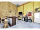 Spacious garage featuring a bar area, television, dartboard, and ample room at 3301 N 200 W, Franklin, IN 46131
