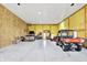 Spacious garage with a high ceiling, concrete floor, and ample room for vehicles and equipment at 3301 N 200 W, Franklin, IN 46131