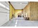 Spacious garage with a high ceiling, concrete floor, and ample room for vehicles and equipment at 3301 N 200 W, Franklin, IN 46131