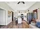 Spacious living room and kitchen area with breakfast bar and decorative barn door at 3301 N 200 W, Franklin, IN 46131