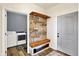 Mudroom includes coat rack and bench with access to the laundry area at 3301 N 200 W, Franklin, IN 46131