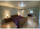 Relaxing bedroom featuring a comfortable bed, mirrored closets, and neutral décor at 386 Shadow Hill Dr, Greenwood, IN 46142