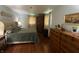 Spacious bedroom featuring hardwood floors, large dresser, comfortable bed, and natural light at 386 Shadow Hill Dr, Greenwood, IN 46142