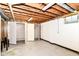 Unfinished basement with open ceiling and storage closets at 392 Aspen Dr, Carmel, IN 46032