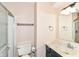 Bathroom featuring a shower with glass door and a vanity with black cabinets at 392 Aspen Dr, Carmel, IN 46032