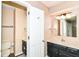Cozy bathroom with a black vanity and a marble countertop at 392 Aspen Dr, Carmel, IN 46032