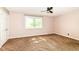 Comfortable bedroom featuring a large window and a ceiling fan at 392 Aspen Dr, Carmel, IN 46032