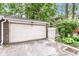 Garage with white door and brick exterior at 392 Aspen Dr, Carmel, IN 46032
