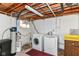 Basement laundry room featuring a washer and dryer at 392 Aspen Dr, Carmel, IN 46032