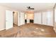 Spacious bedroom with ceiling fan, multiple closets, and access to an en suite bathroom at 392 Aspen Dr, Carmel, IN 46032