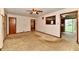 Living room featuring classic carpet and neutral walls at 415 N 3Rd St, Elwood, IN 46036