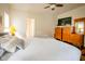 Spacious main bedroom featuring wood floors, neutral tones, and bright natural light at 4305 W Coyote Run Ct, Muncie, IN 47304